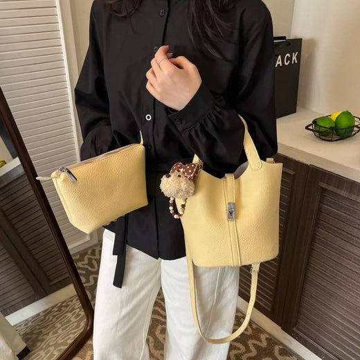 Lélia Leather Bucket Crossbody Bag